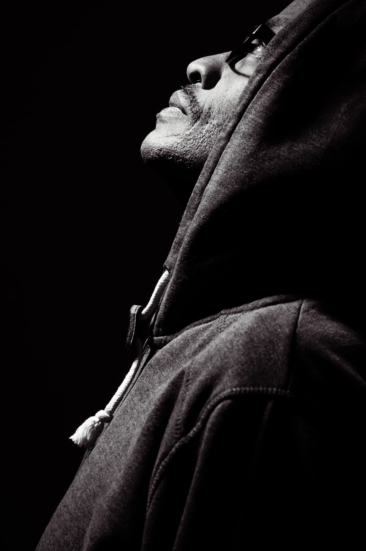 Black and white profile portrait of Lenny Rukundo, commercial and editorial photographer in Cape Town and Johannesburg